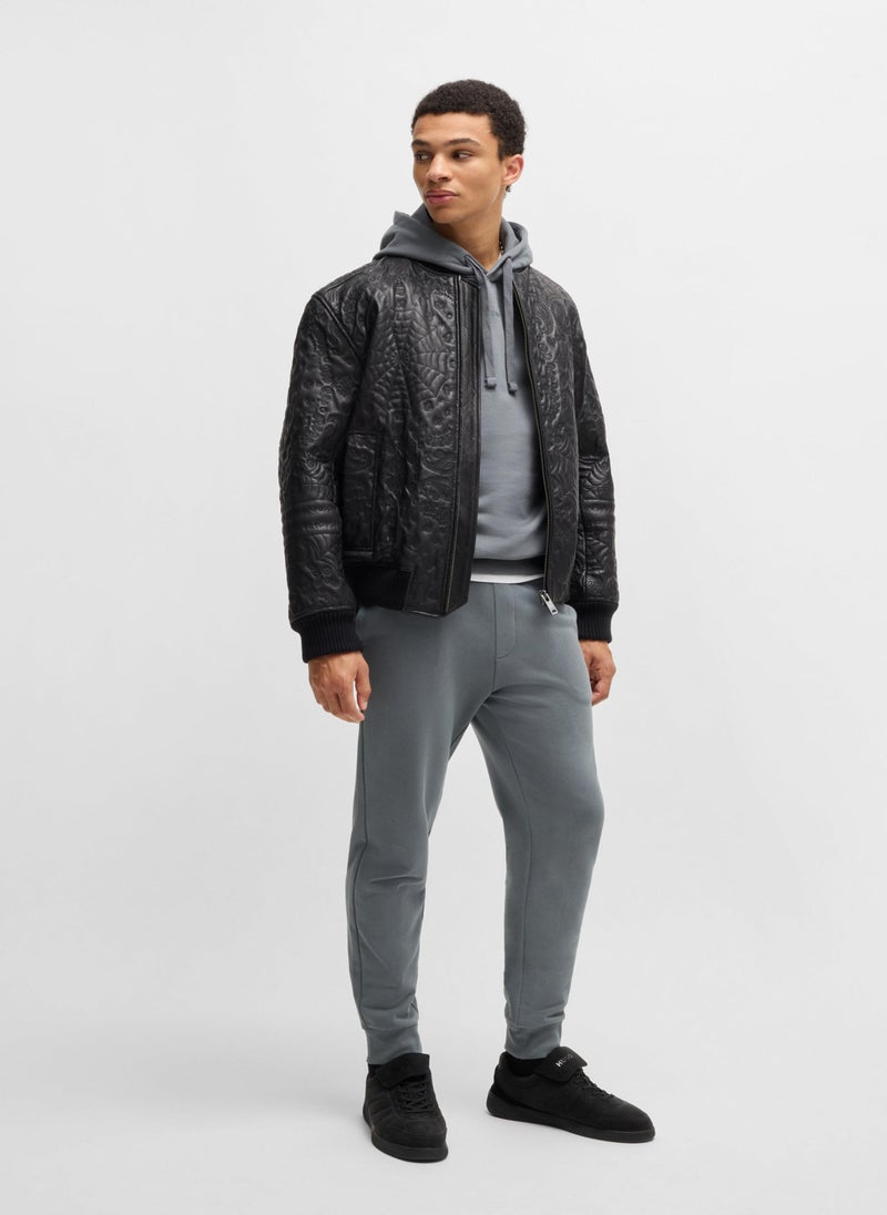 Cotton-terry relaxed-fit hoodie with logo print