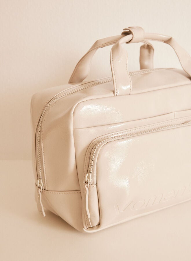 Ivory patent leather briefcase toiletry bag