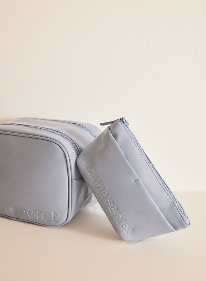 Small blue patent toiletry bag