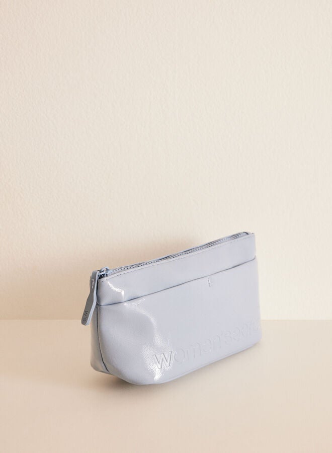 Small blue patent toiletry bag