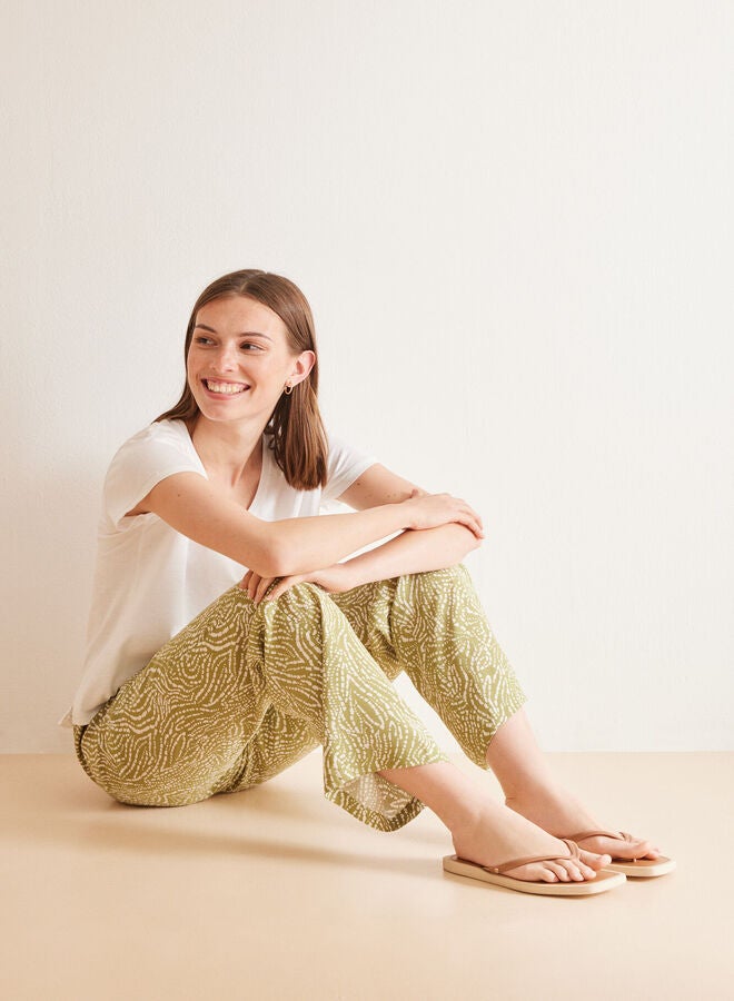 Green ethnic print trousers