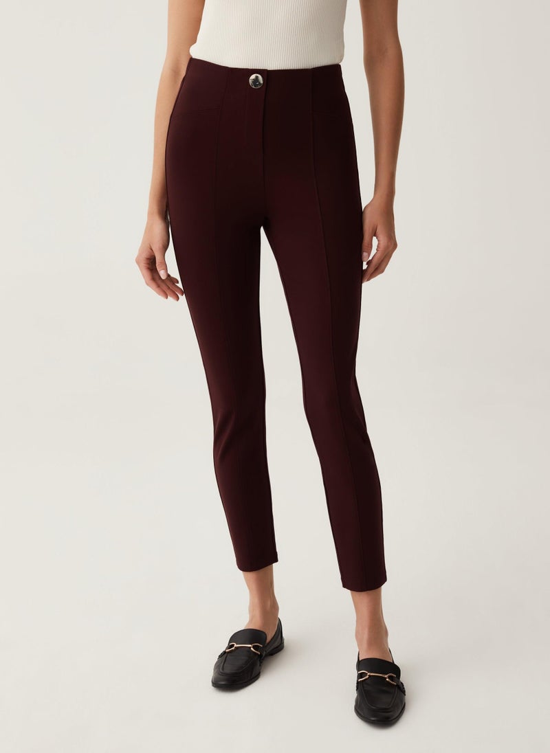 Stretch leggings with button