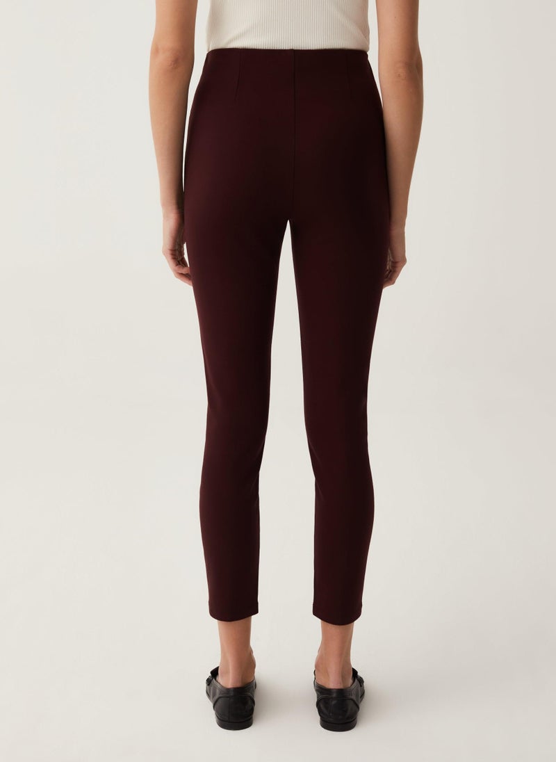 Stretch leggings with button