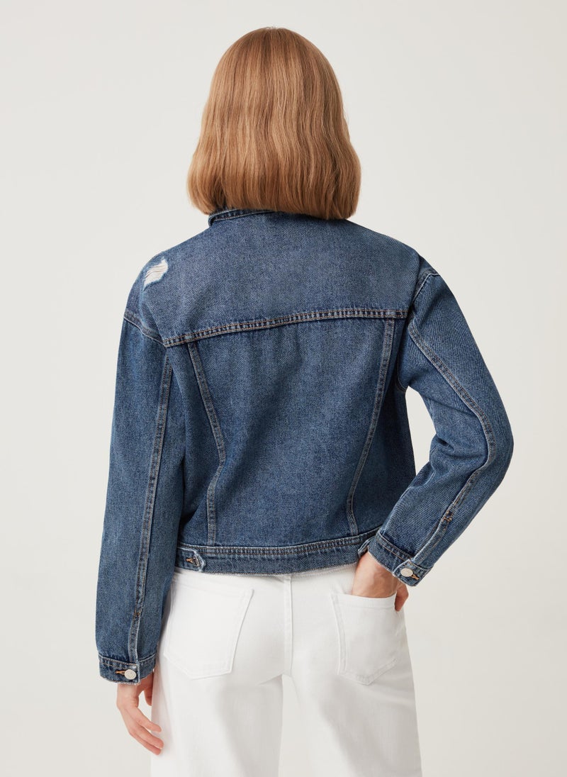 Denim jacket with abrasions