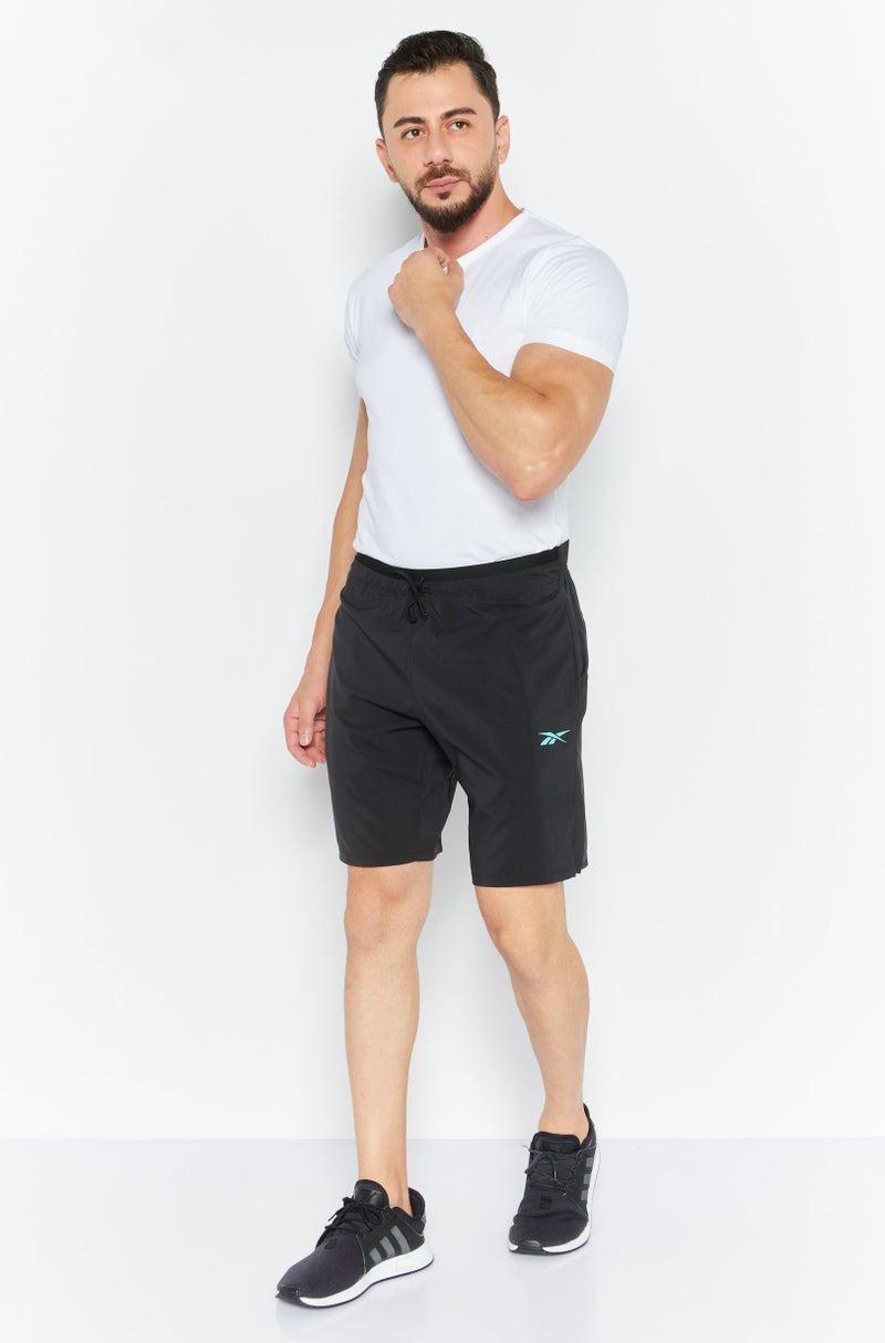 Men Sportswear Fit Brand Logo Strength Short, Black