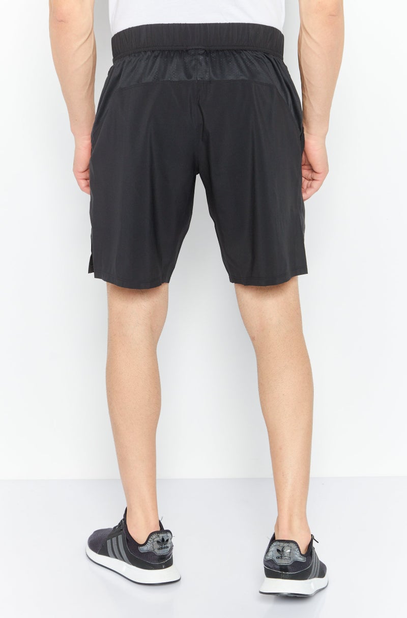 Men Sportswear Fit Brand Logo Strength Short, Black