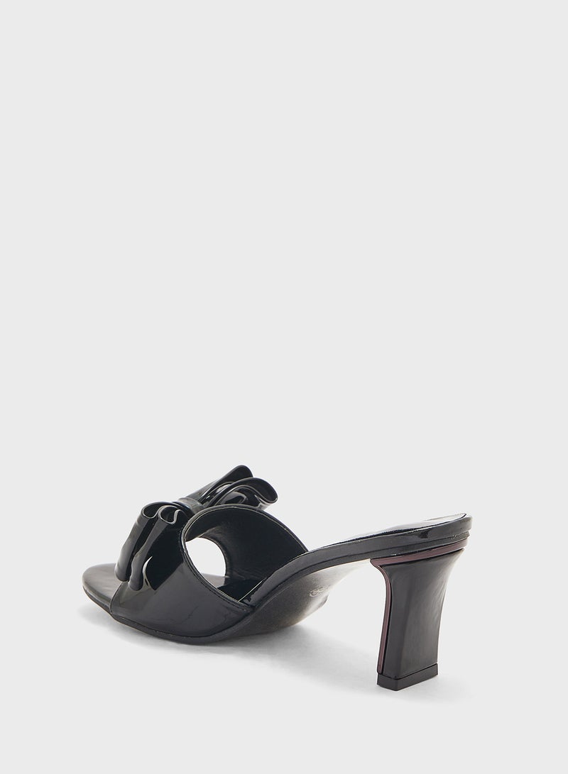 Oversized Bow Mule Heel Sandal