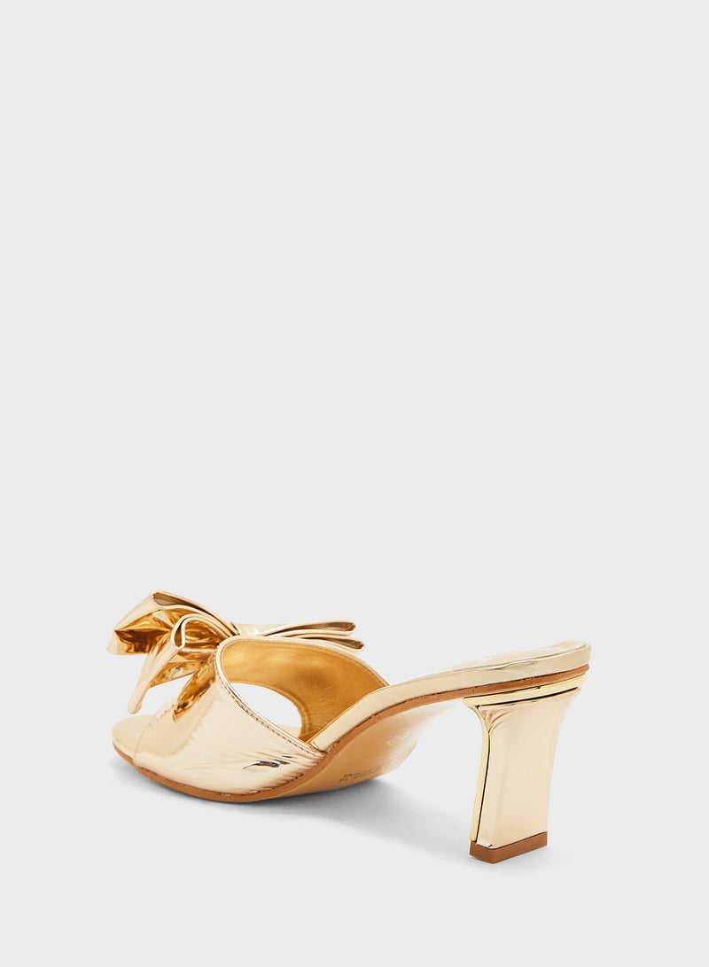 Oversized Bow Mule Heel Sandal