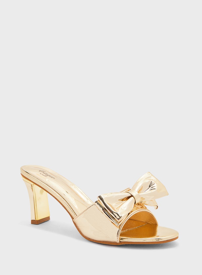 Oversized Bow Mule Heel Sandal