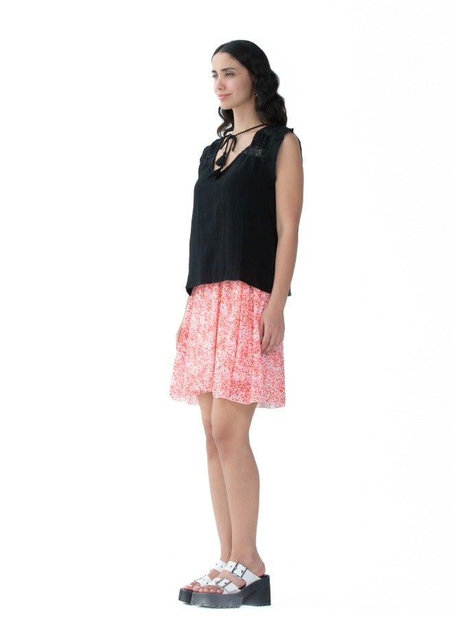 A playful short skirt with a bright floral pattern, adding a pop of color to your wardrobe.