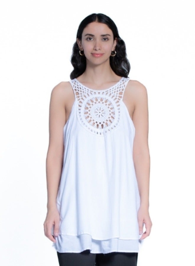 Beautiful sleeveless top with intricate crochet detailing, perfect for summer days.