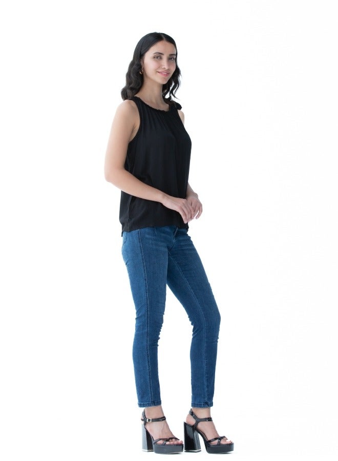 Versatile black sleeveless top with a gathered neckline, perfect for layering or standalone use.