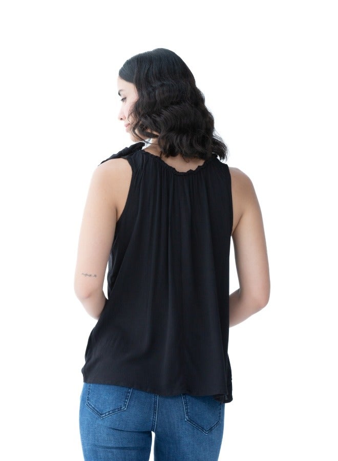 Versatile black sleeveless top with a gathered neckline, perfect for layering or standalone use.