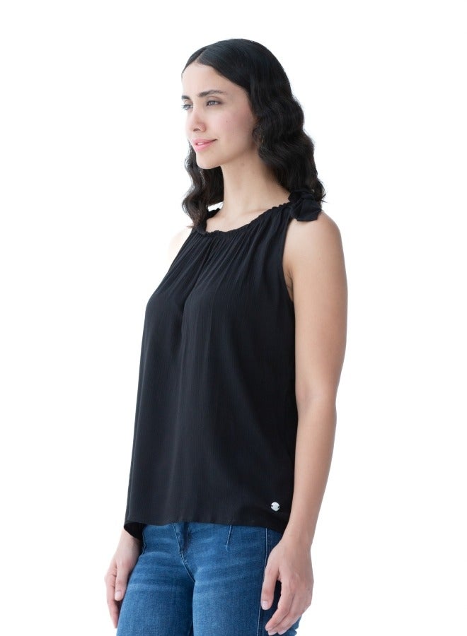 Versatile black sleeveless top with a gathered neckline, perfect for layering or standalone use.