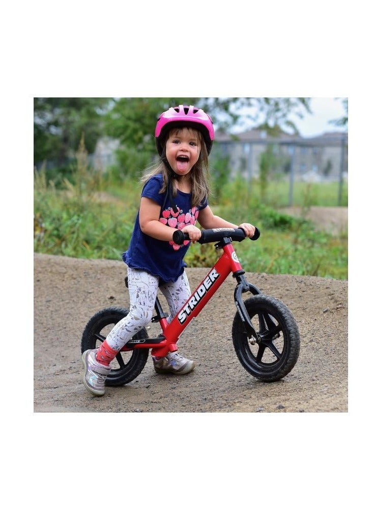 Strider 12” Sport Bike - No Pedal Balance Bicycle for Kids 18 Months to 5 Years - Includes Safety Pad, Padded Seat, Mini Grips & Flat-Free Tires - Tool-Free Assembly & Adjustments