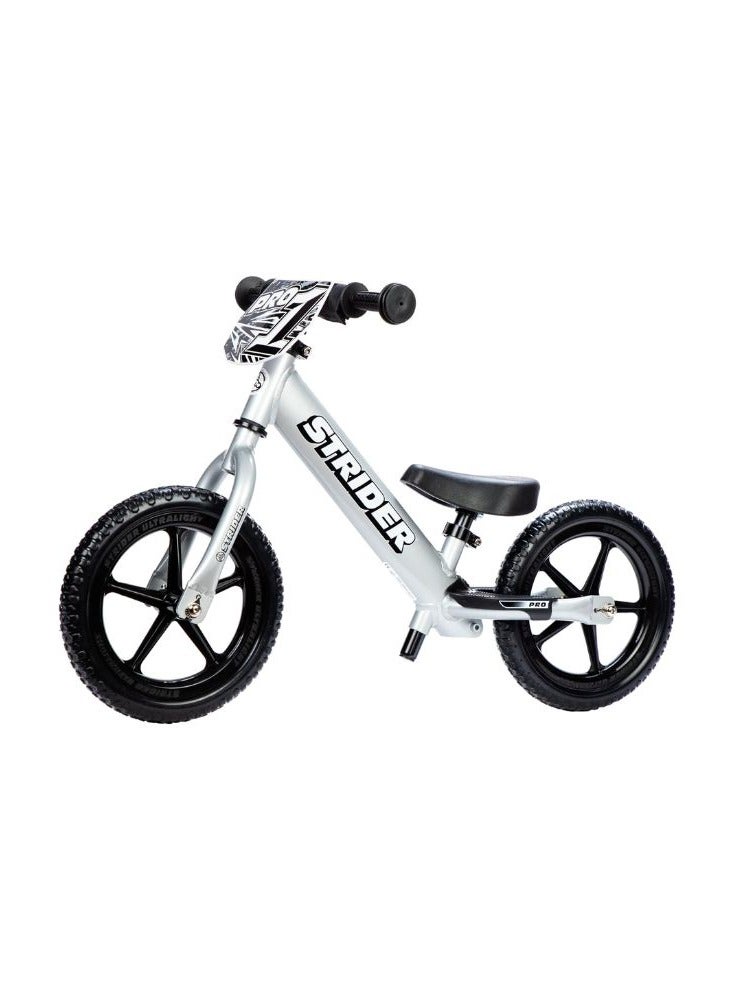 Strider 12” Pro Bike - No Pedal Balance Bicycle for Kids 18 Months to 5 Years - Includes Safety Pad, Padded Seat, Mini Grips & Flat-Free Tires - Tool-Free Assembly & Adjustments