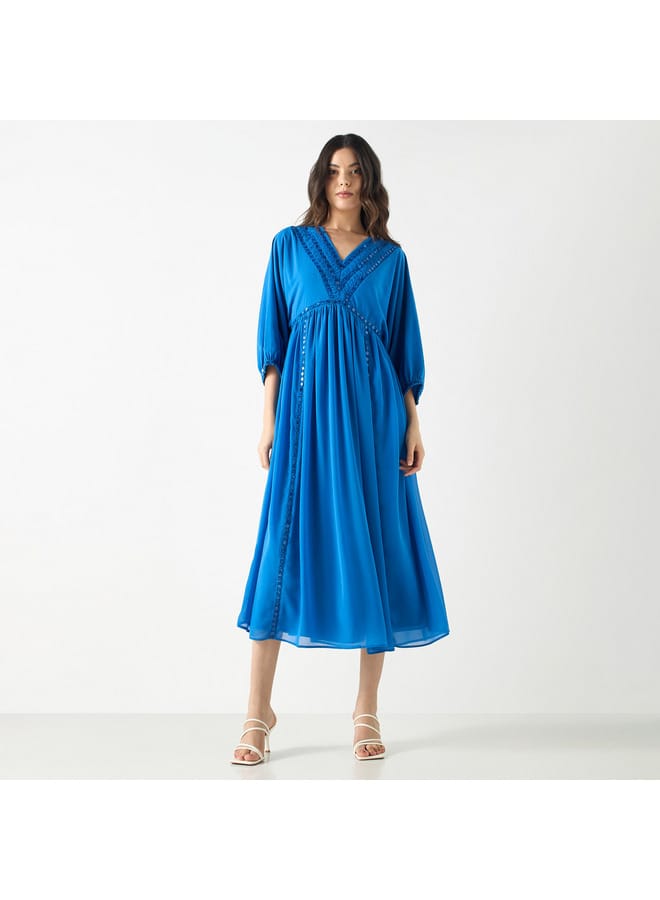 Iconic Embellished V-neck Dress with Volume Sleeves