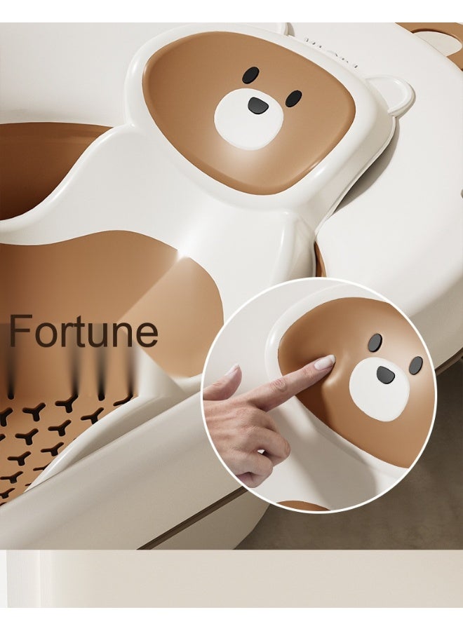 Bear-shaped baby bath seat with inclined headrest, anti-slip, and easy to clean.