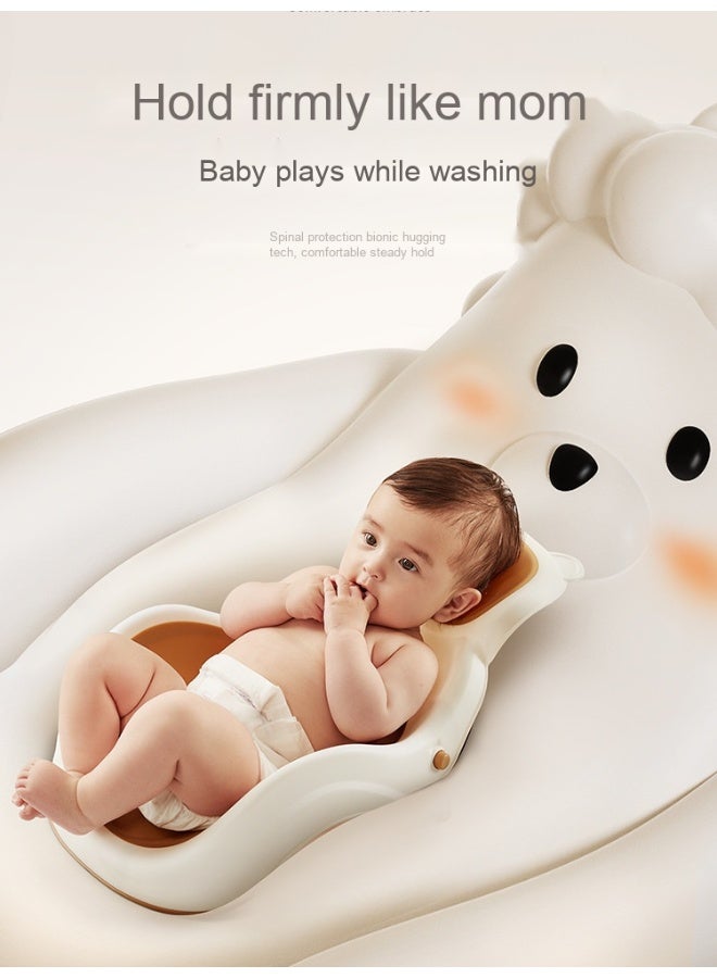 Bear-shaped baby bath seat with inclined headrest, anti-slip, and easy to clean.