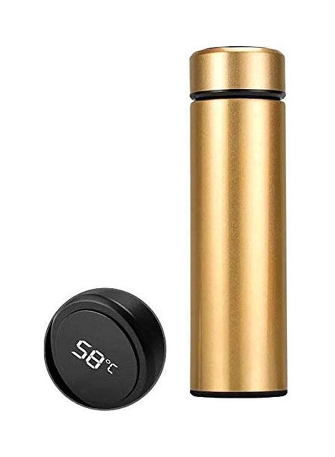 A Stainless Steel Thermos Flask With An Internal Filter And Digital Touch Screen To Display The Temperature Gold