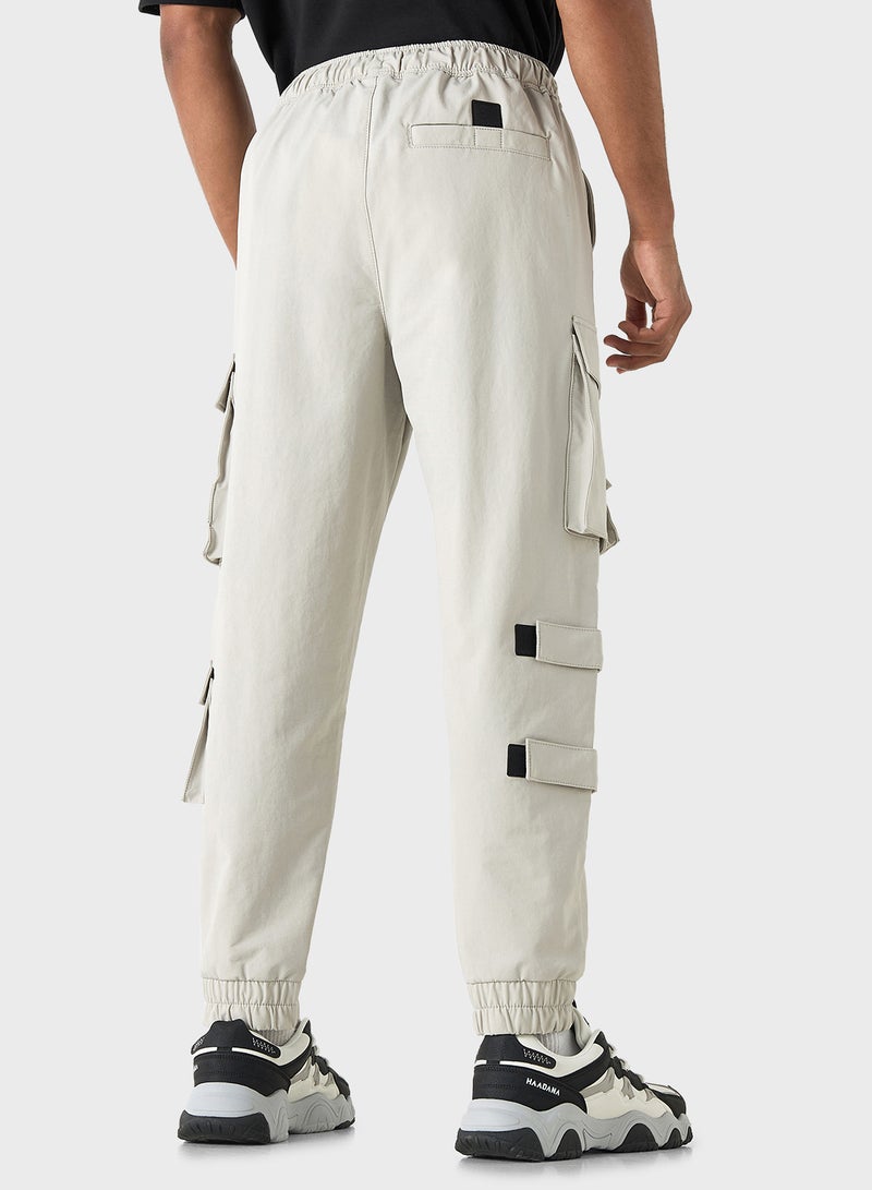 Solid Relaxed Fit Cargo Pants with Drawstring Clos