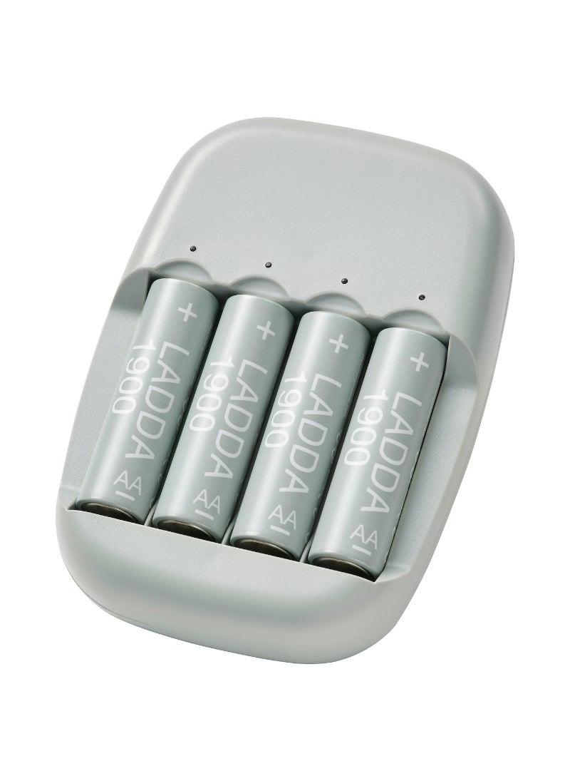 Battery Charger And 4 Batteries