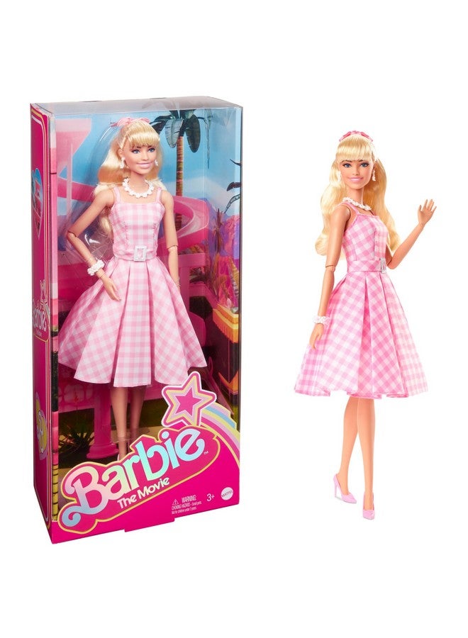 The Movie Doll Wearing Pink And White Gingham Dress With Daisy Chain Necklace