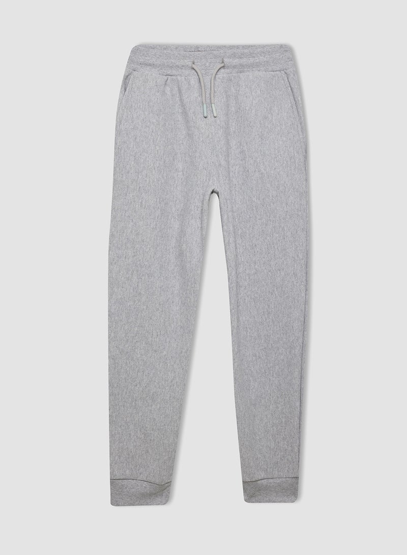 Grey Jogger Pants With Elastic Cuffs And Pockets