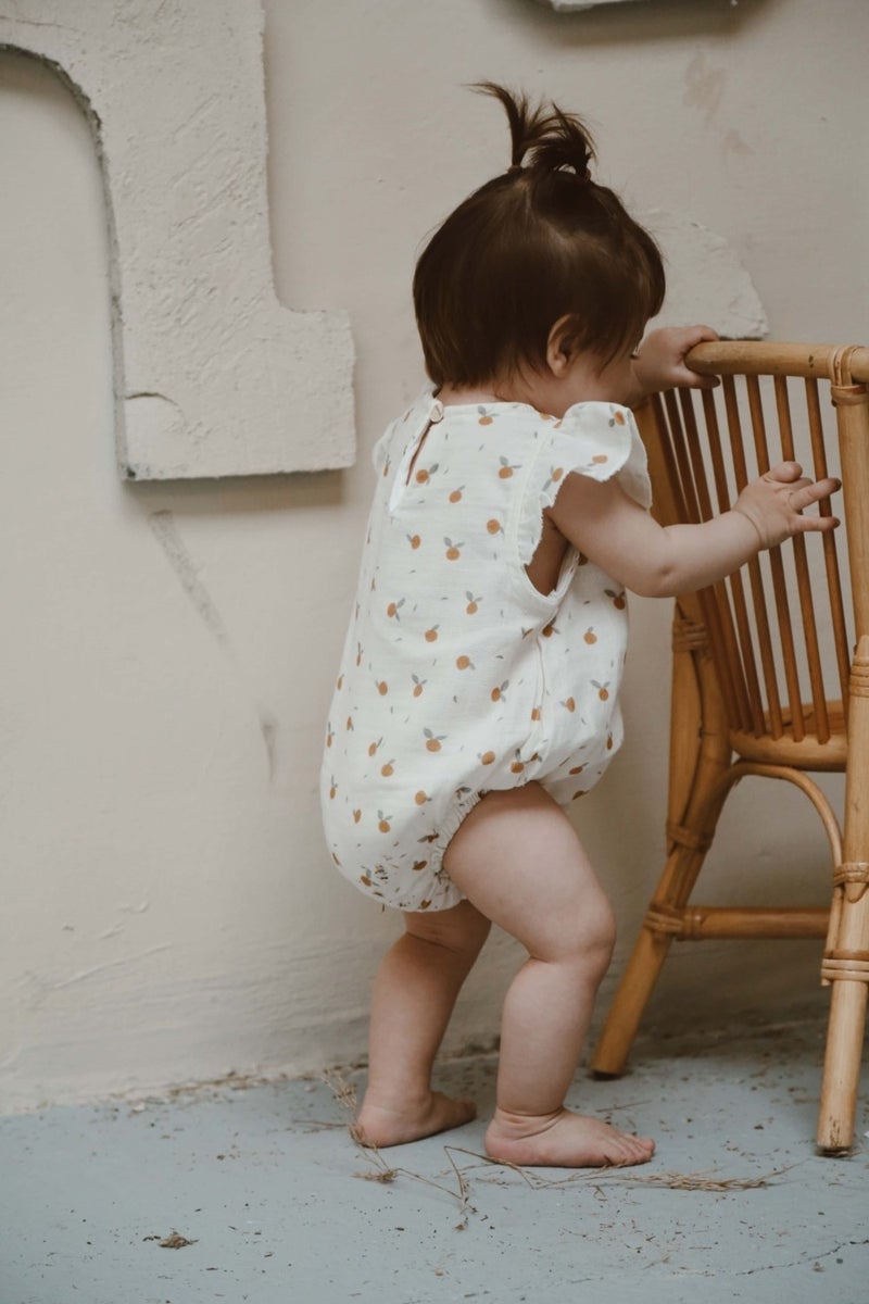 Orange Printed Ruffle Muslin Baby Jumpsuit