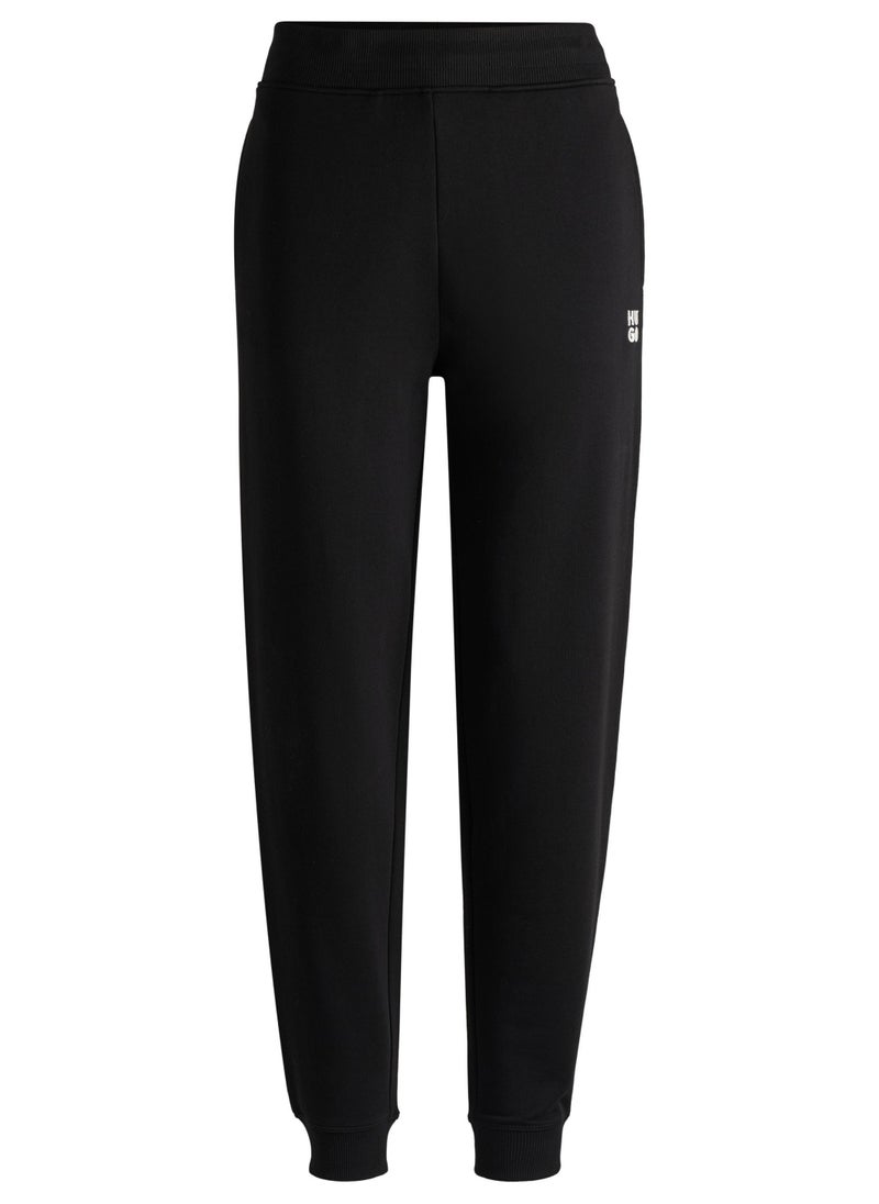 Cotton-terry tracksuit bottoms with stacked logo