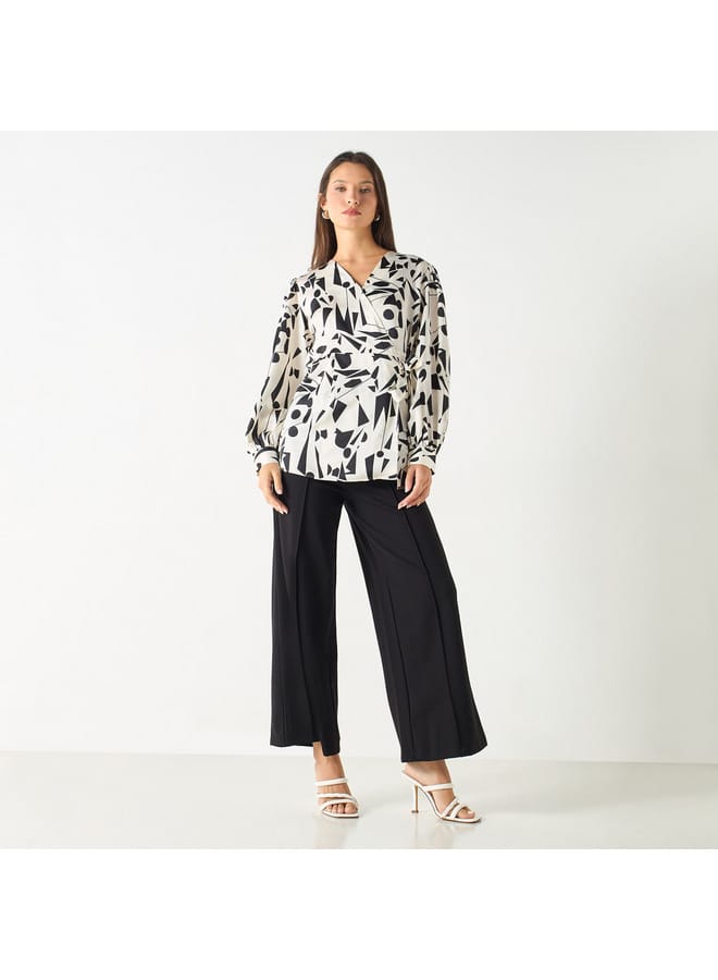 Iconic Printed V-neck Top with Tie-Ups and Long Sleeves