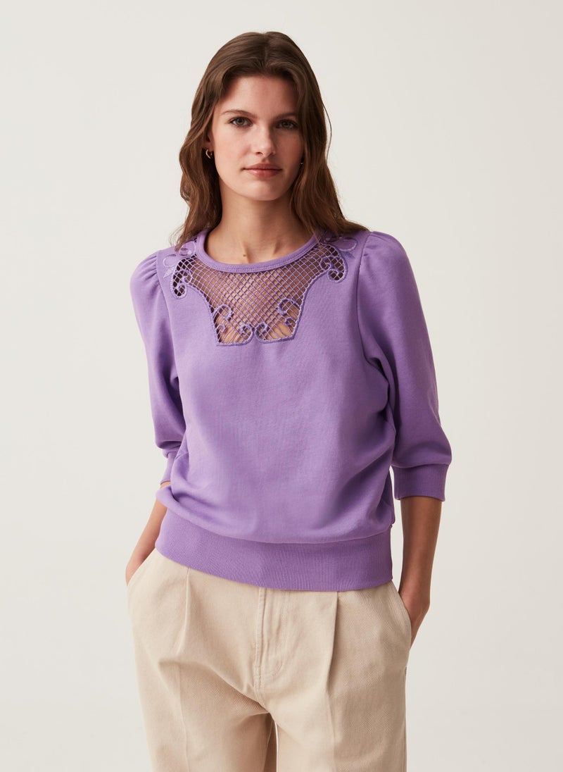 Round-neck sweatshirt with crochet insert