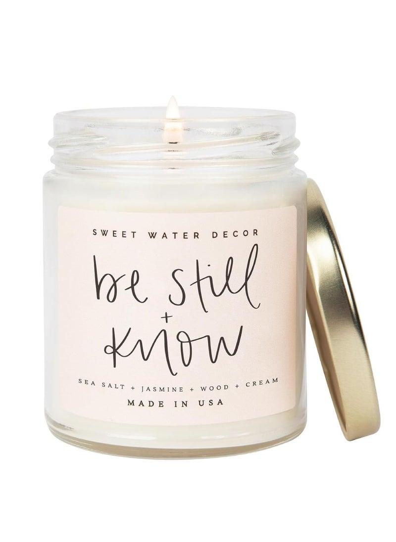 Sweet Water Decor, Be Still and Know, Sea Salt, Jasmine, Cream, and Wood Scented Soy Wax Candle for Home | 9oz Clear Jar, 40 Hour Burn Time, Made in the USA