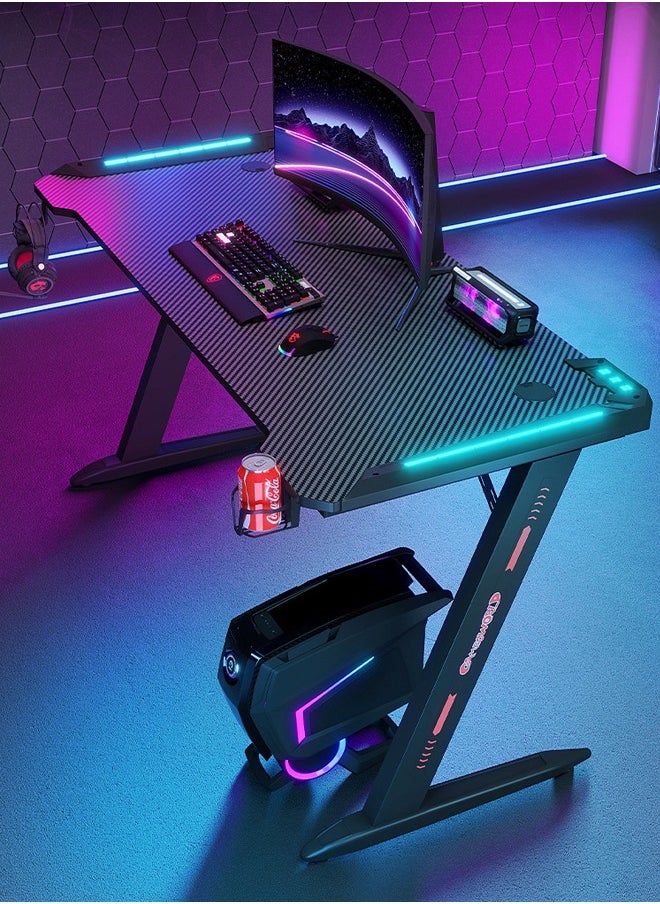 Premium Gaming Desk with RGB LED Lights, E-Sports Computer Desk with Carbon Fiber Surface, Cup Holder and Headphone Hook, Home Gaming Desk with RGB Atmosphere Lighting 120 cm