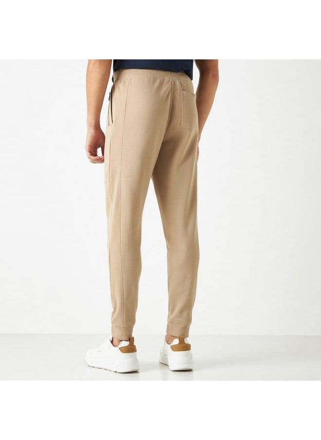 Iconic Solid Joggers with Drawstring Closure and Pockets