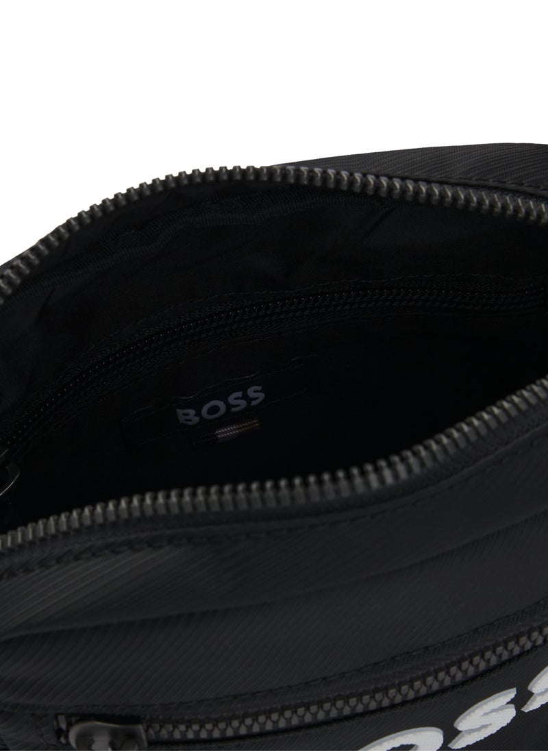 Crossbody bag with contrast logo and signature-stripe strap