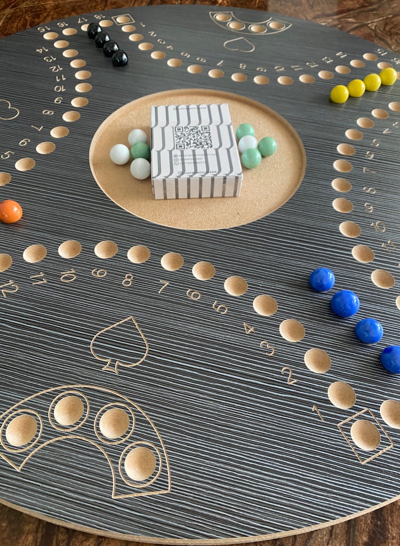 Jackaroo board game with two sides for 4 and 6 players with glass marbles, playing cards and bag.