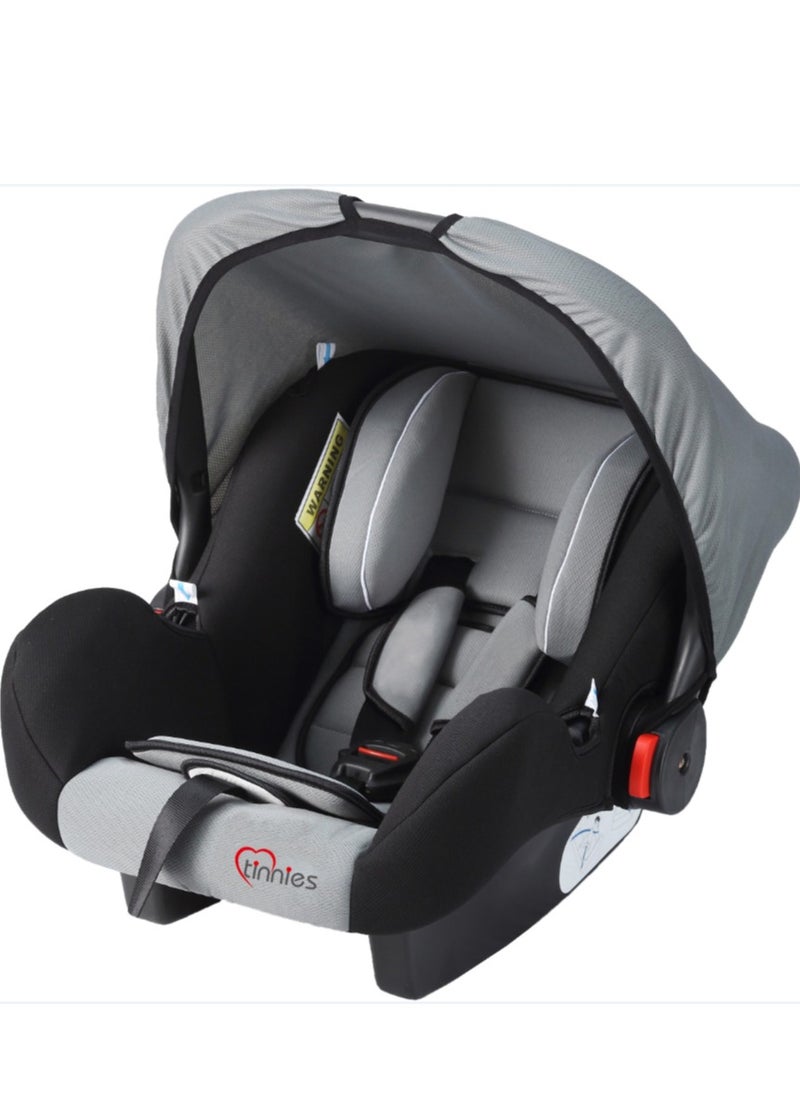 Infant carrier-style child safety seat for cars, newborn baby sleeping basket, portable car cradle, meeting ECE R44 standards.