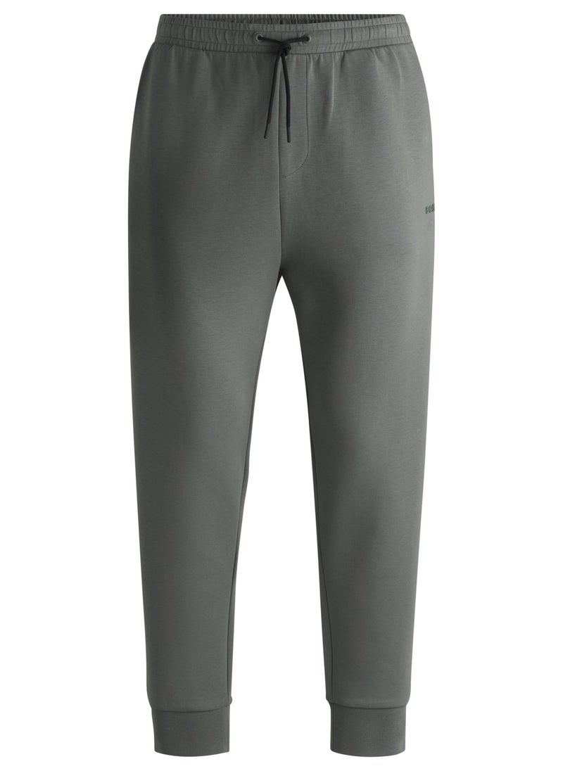 Stretch-cotton tracksuit bottoms with logo print