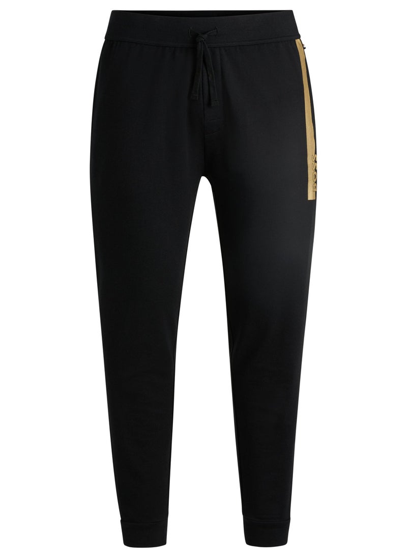 Cotton-terry tracksuit bottoms with metallic logo