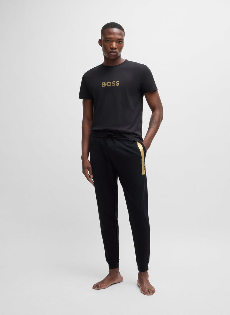 Cotton-terry tracksuit bottoms with metallic logo