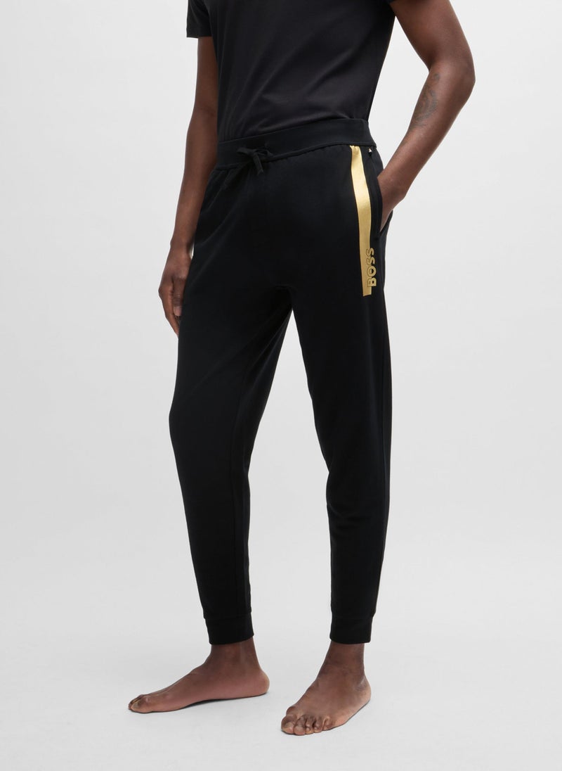 Cotton-terry tracksuit bottoms with metallic logo