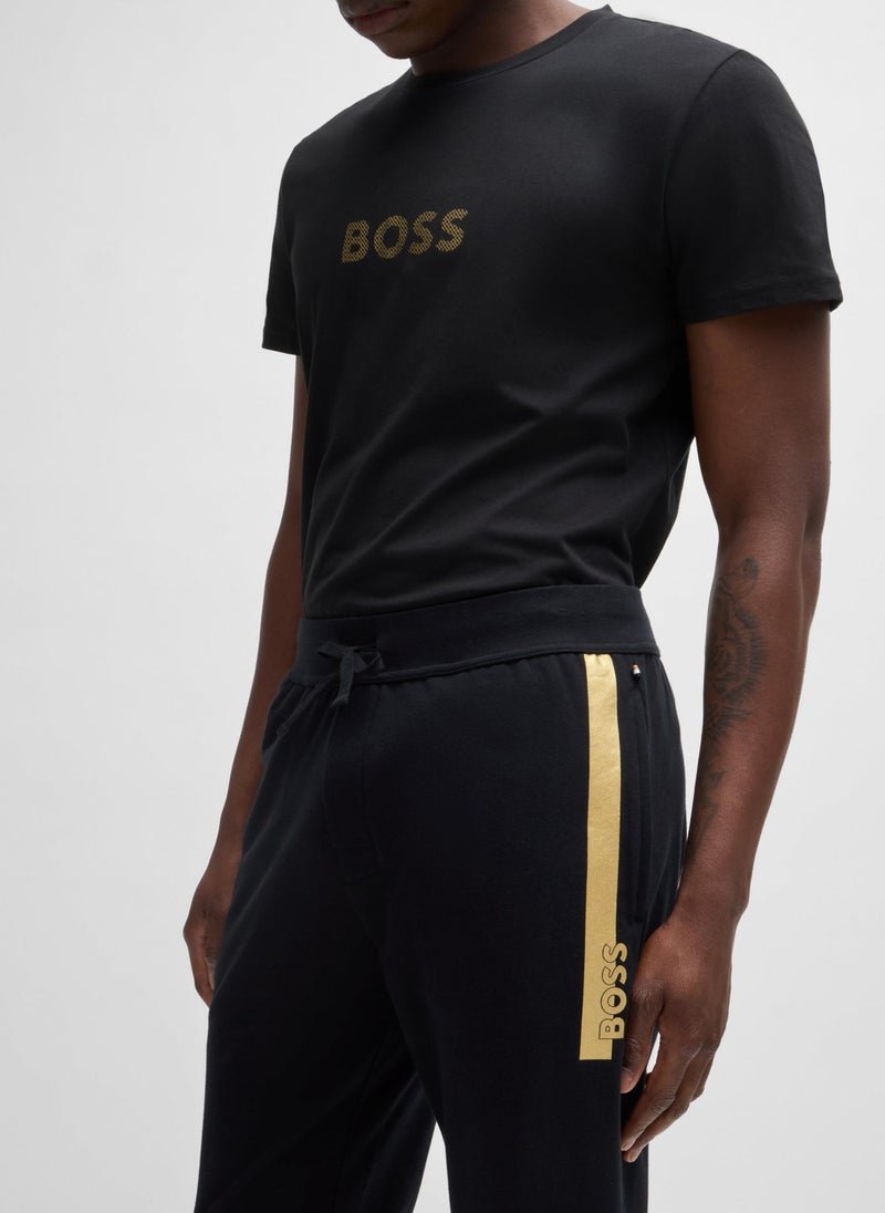 Cotton-terry tracksuit bottoms with metallic logo