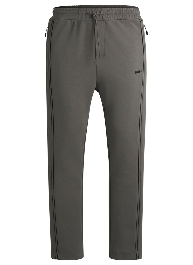 Cotton-blend tracksuit bottoms with tape inserts