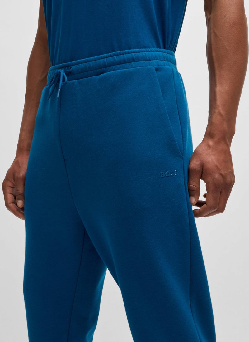 Stretch-cotton tracksuit bottoms with logo print