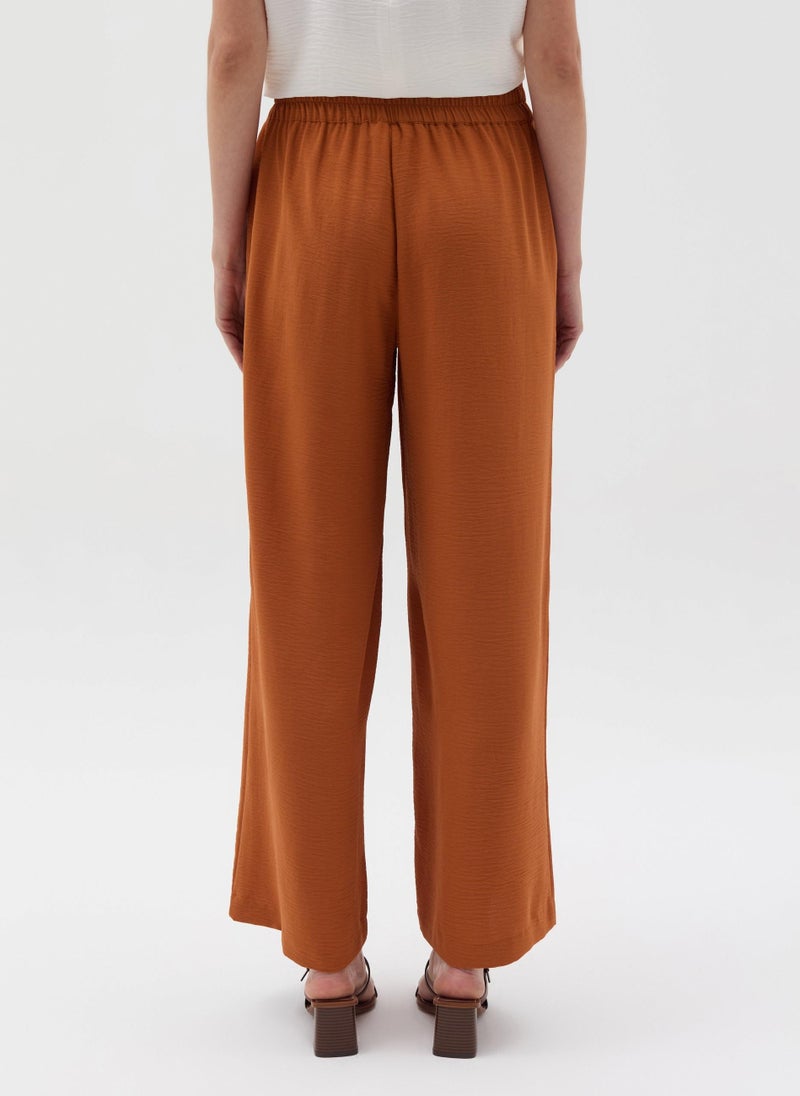 Crinkle-effect fluid trousers