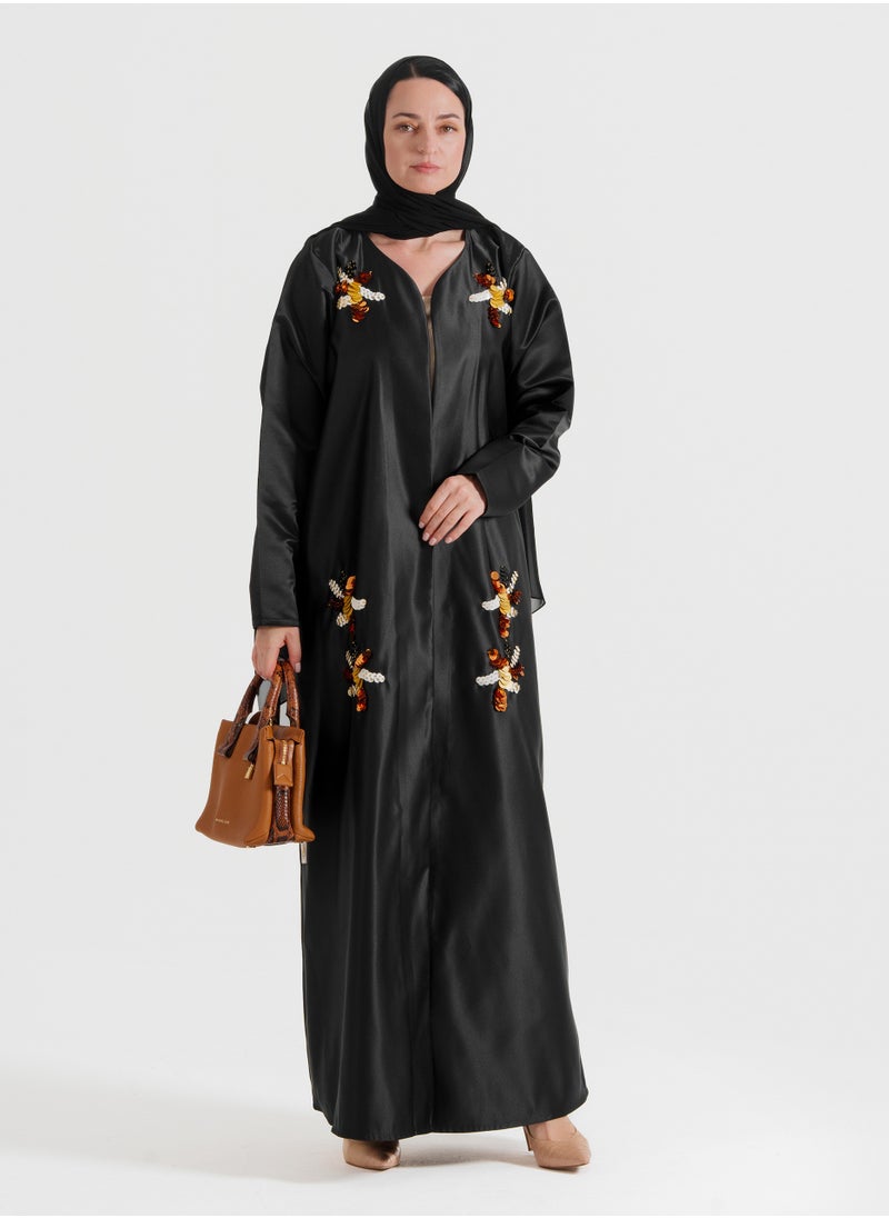 An exquisite abaya adorned with gold mix decorative hand embroidery