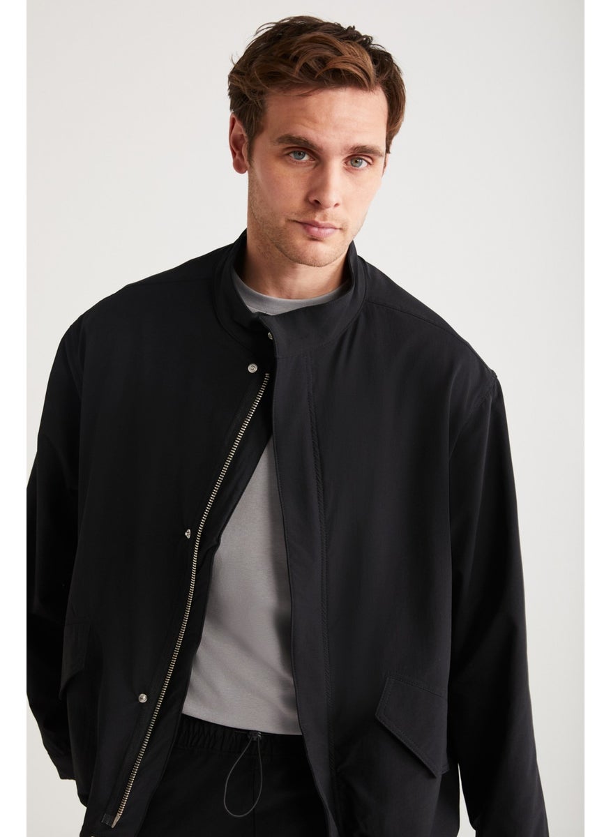 Roger Men's Stretchy Technical Fabric Thick Zippered Lined Sleeve Cuffed Flap Pocket Black Jacket