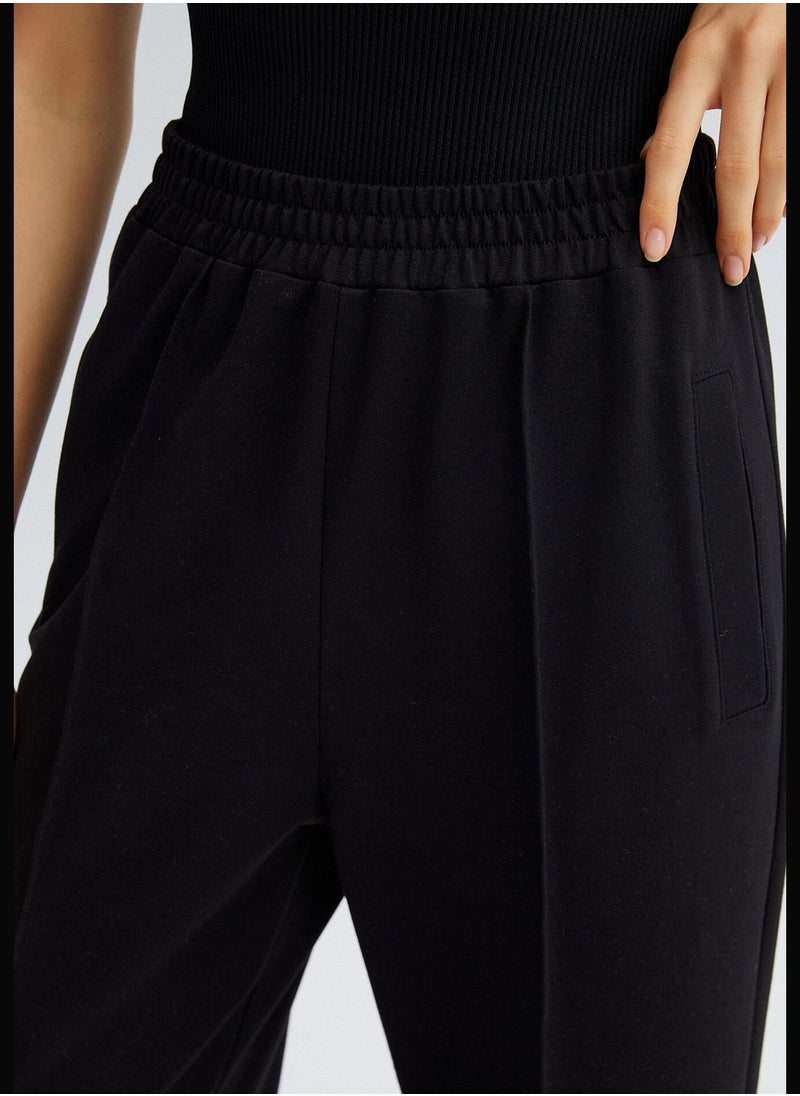 SWEATPANTS WUTH CUFF DETAIL