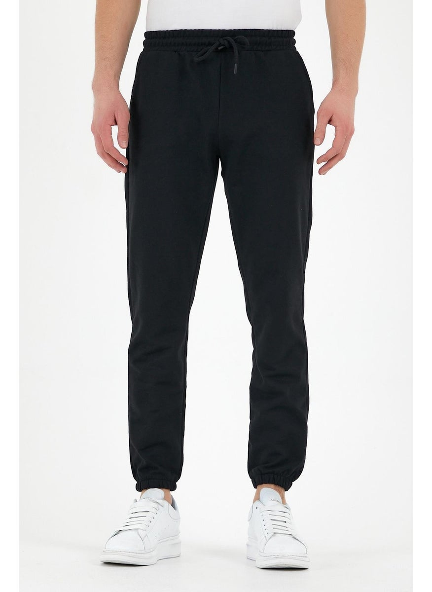 Black Men's Sweatpants with Labeled Back and Side Pockets Regular Fit Elastic Legs.